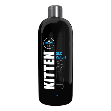 Black bottle of Kitten Ultra Glo Wash on a white background