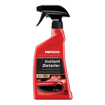 Red bottle of Mothers Instant Detailer with a black spray nozzle on a white background