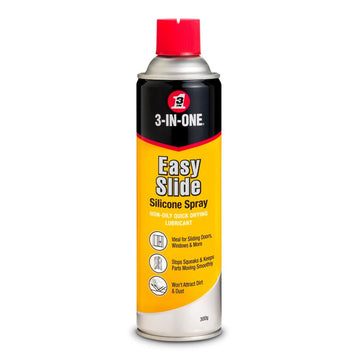 A 300ml aerosol can of 3-In-One Easy Slide Silicone Spray lubricant, featuring a red cap, black and yellow label, and silver bottom, shown on a white background.